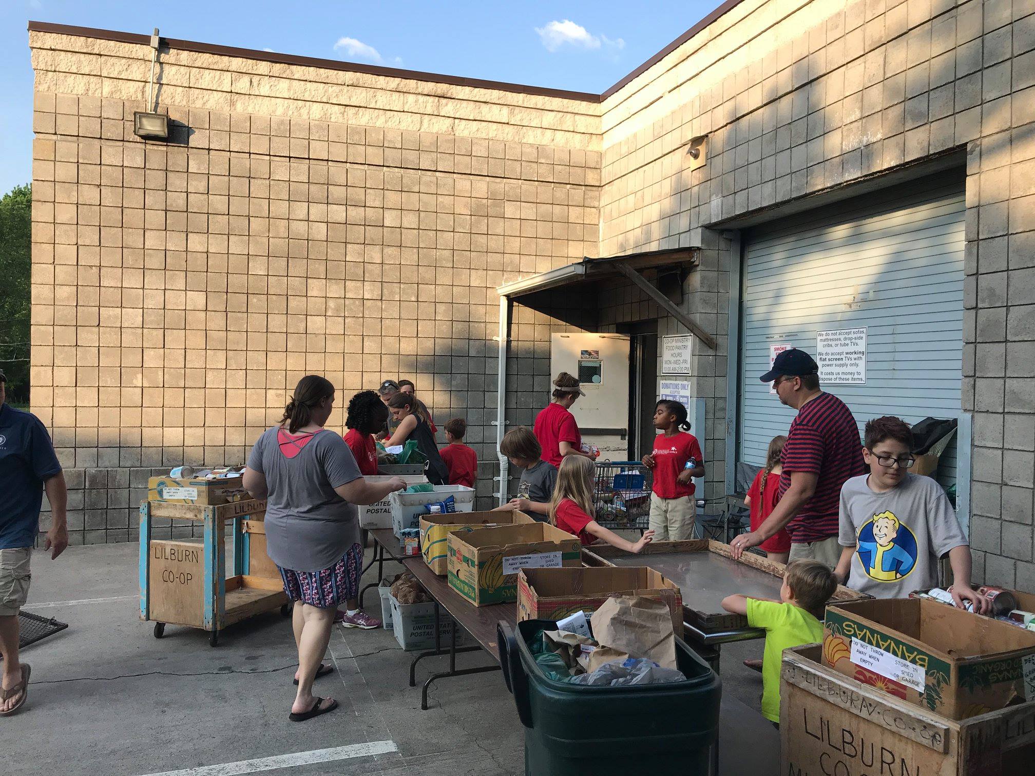 Lilburn Coop Volunteers Sorting Donations Spring